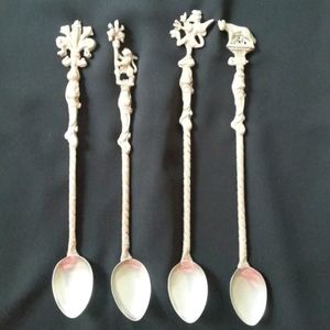 4 antique spoons by Montagnani Italy